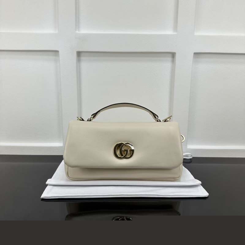 G*u*i top handle bags